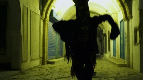 Dance with the devil in a dark street Stock Footage 123655512