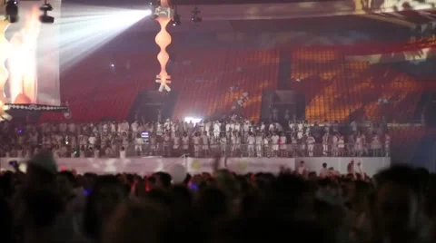 Dance floor, VIP area above crowd with dancing and empty rows of seats Stock Footage 63661474