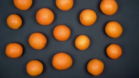 Dance of Fruit. Oranges Move in Different Directions on a Black Background. Stock Footage 74082290