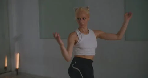Dance instructor practicing contemporary dance choreography in ballet studio Stock Footage 229487868
