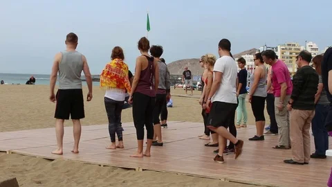 Dance lesson on the beach Stock Footage 71810955