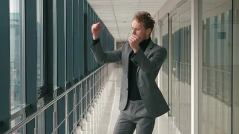 Dance loop funny man dancing in office having fun celebrating with funky looping Stock Footage 146022425