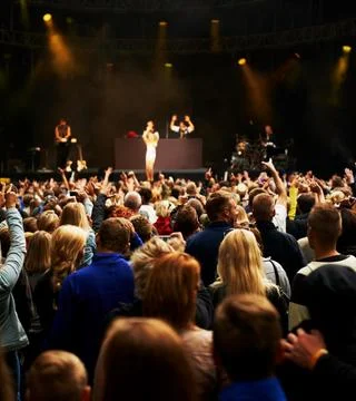 Dance, music and stage with crowd at festival for concert, dj show and rave Stock Photos