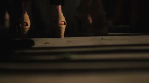 Dance Party. Closeup of the foots of dancing people Stock Footage 61076699
