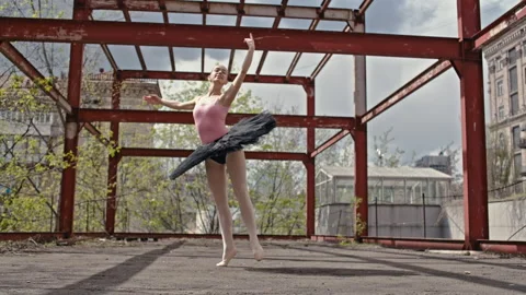 Dance performance of a ballerina dancing in an urban landscape Stock Footage 244939705