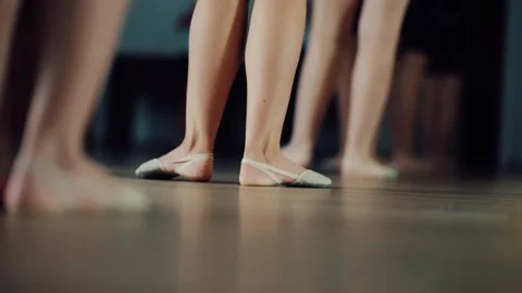 Dance practice with several dancers in a studio focusing on feet and positioning Stock Footage 344739681