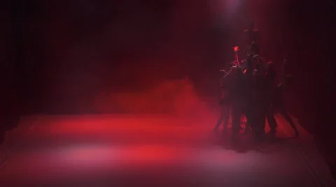 Dance on a Red Background in the Dark Stock Footage 60824389