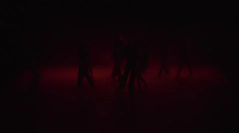 Dance on a Red Background in the Dark Stock Footage 60824608