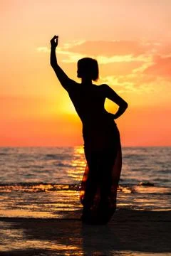 Dance at sunset Photos