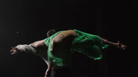 Dance support in rotating around close up. Man holds woman on his shoulders Stock Footage 232957286