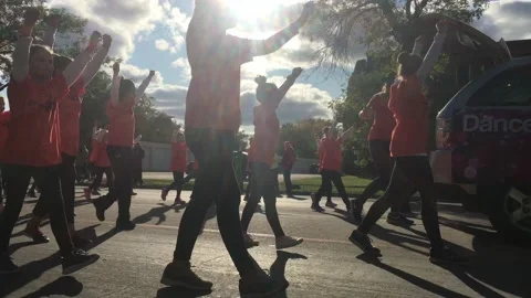 Dance Team Parading By in Sun Video stock 117139177