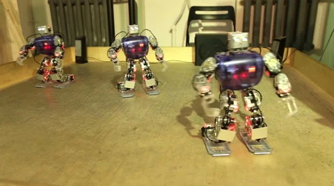 The dance of three robots Stock Footage 55385701