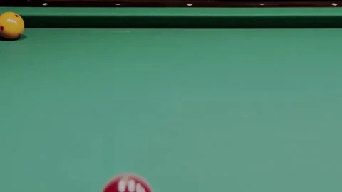 Dance of a yellow and a red ball over a billiard table 스톡 동영상 277187987