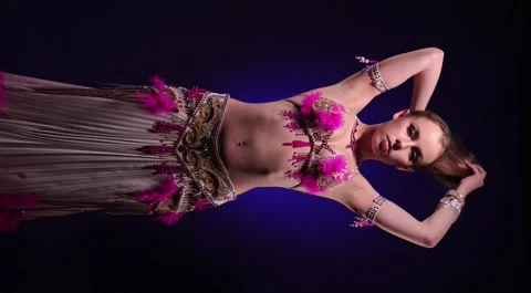 Dancer in bright oriental costume dancing belly dance Stock Footage 291133843