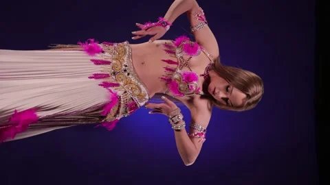 Dancer in bright oriental costume dancing belly dance Stock Footage 291136670