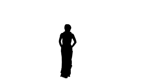 Dancer in a chic dress turns in an flamenco. White background. Silhouette Vídeos de archivo 91643420
