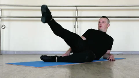 Dancer choreographic warm-up, ballet performs leg swing exercises. Stock Footage 277116298