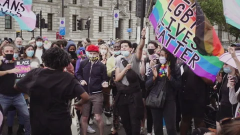 Dancer in crowd at Black Trans Lives Matter protest, London 27th June 2020 動画素材 258270022