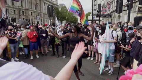 Dancer in crowd at Black Trans Lives Matter protest, London 27th June 2020 動画素材 258270262