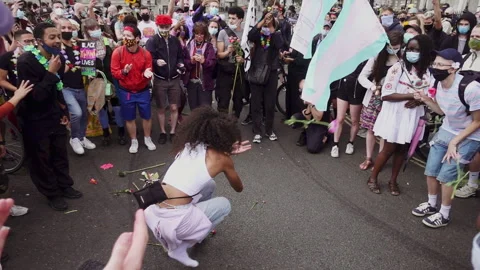Dancer in crowd at Black Trans Lives Matter protest, London 27th June 2020 動画素材 258275136