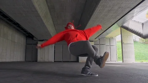 Dancer Dancing In Front Of The Futuristic Architecture In Urban Area Stock Footage 87710660