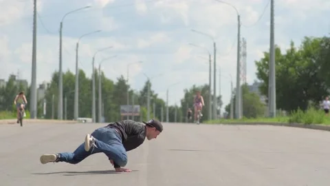 Dancer dancing hip hop on the road. Youth subculture. Slow motion Stock Footage 138808696