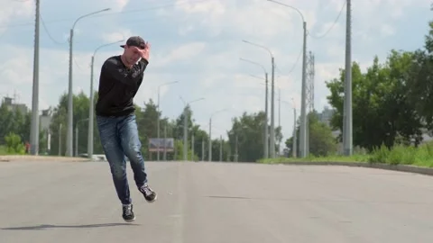 Dancer dancing hip hop on the road. Youth subculture. Slow motion Stock Footage 138808770