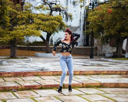Dancer dancing in a park Stock Photos