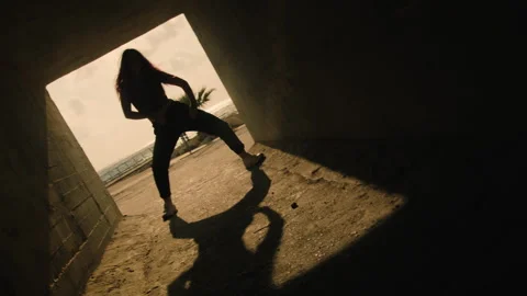 Dancer in a dark passage Stock Footage 275106539