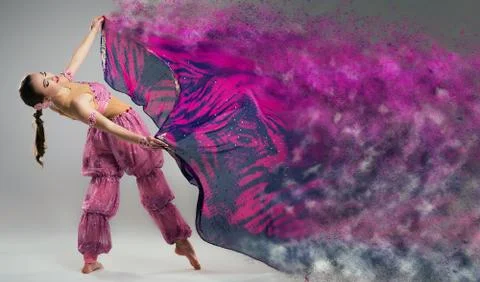 Dancer with disintegrating scarf. Stock Photos
