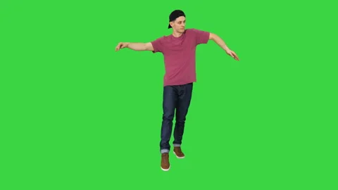 The dancer does wave his arms on a Green... | Stock Video | Pond5