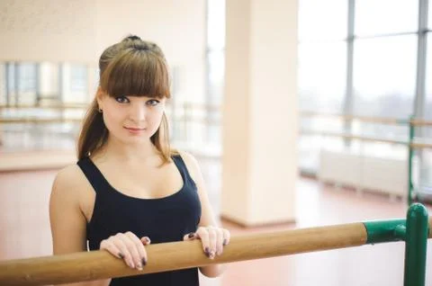 Dancer is doing exercises in ballet class Stock Photos