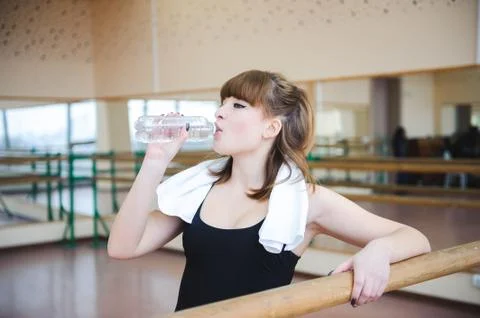 Dancer is doing exercises in the ballet class Stock Photos