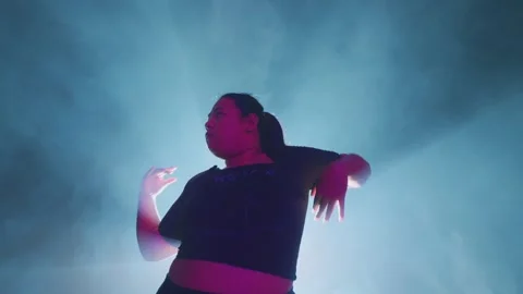 Dancer in Dramatic Smoky Atmosphere Stock Footage 296593863