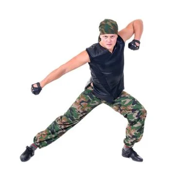 Dancer dressed soldier jumping Stock Photos
