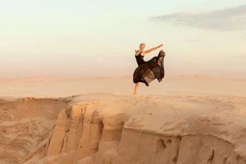 Dancer jumped up during the dance. Stock Photos