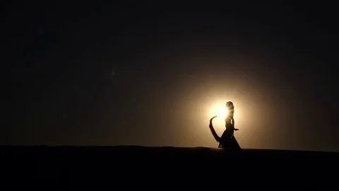 Dancer makes sexual movements with her body. Silhouette. Slow motion Stock Footage 79008890