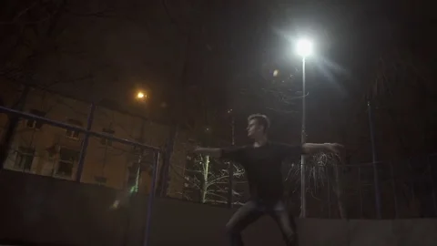 Dancer man kneads on the street Stock Footage 77381102