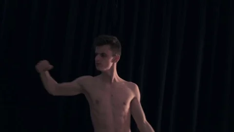 Dancer moves his hands in different directions Stock Footage 77381396