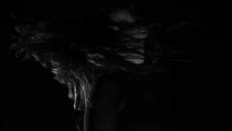 Dancer performers expressive movement in moody dramatic lighting Stock Footage 98671126