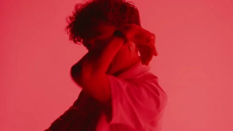 Dancer Performing Against Red Background Stock Footage 255537733