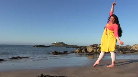 Dancer Performing And Practicing on the beach Stock Footage 55338340