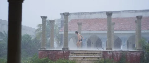 Dancer performing in the rain Stock Footage 85844558