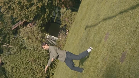 Dancer Performs Improvised Contemporary Elements On A Sunny Lawn 4k Video Stock Footage 275346905