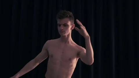 Dancer performs movements with his hands and head Stock Footage 77378204