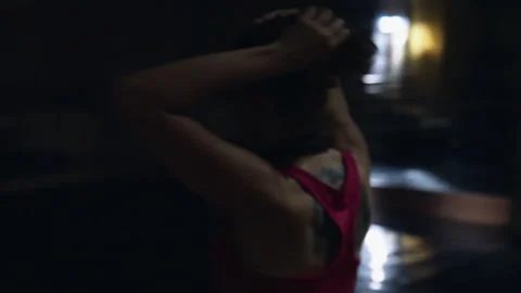 Dancer practicing and tying her hair Stock Footage 258212640