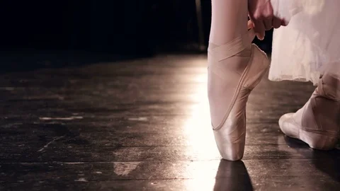 Dancer putting on her ballet shoes Stock Footage 76046431