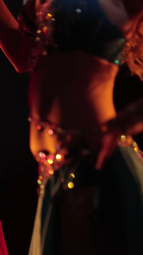 Dancer in red and blue oriental costumes dance belly dance Stock Footage 306611243