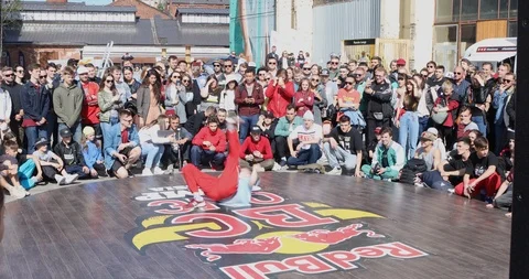 Dancer In Red Pants Dancing Bottom Breakdance Surrounded By A Crowd. Stock-Footage 109991399