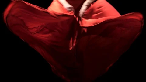 Dancer in the rhythm of the music develops the skirt. Black background. Close up Stock Footage 91652898
